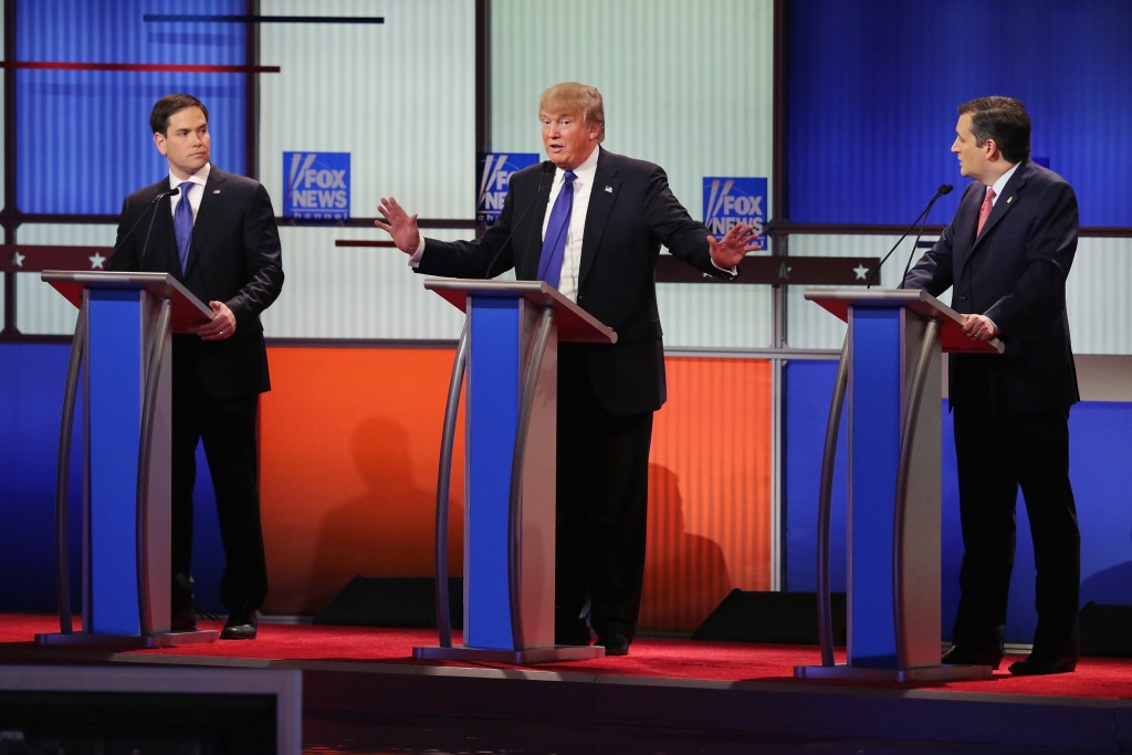 DETROIT, MI - MARCH 03:  Republican presidential candidates (Lto R) Sen. Marco Rubio (R-FL), Donald Trump and Sen. Ted Cruz (R-TX) participate in a debate sponsored by Fox News at the Fox Theatre on March 3, 2016 in Detroit, Michigan. Voters in Michigan will go to the polls March 8 for the State's primary.  (Photo by Chip Somodevilla/Getty Images)