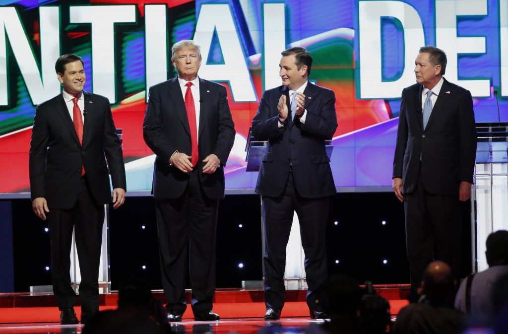 Republican presidential candidates, Sen. Marco Rubio, R-Fla., left, Donald Trump, Sen. Ted Cruz, R-Texas,  and Ohio Gov. John Kasich, right,  stand together before the start of the Republican presidential debate sponsored by CNN, Salem Media Group and the Washington Times at the University of Miami,  Thursday, March 10, 2016, in Coral Gables, Fla. (AP Photo/Wilfredo Lee)